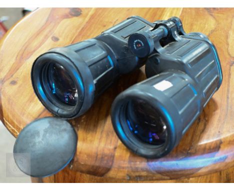 A pair of Zeiss 15 x 60 binoculars with rubber casing&nbsp; Some splits to rubber 