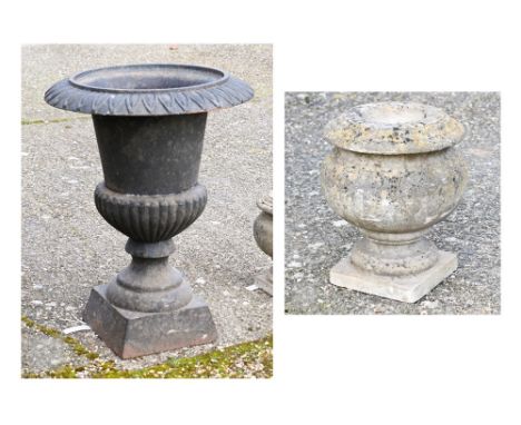A weathered black patinated cast iron urn planter to/w a small bulbous stone urn planter (2) 