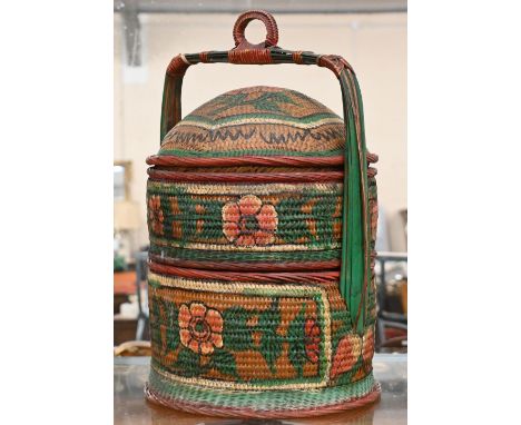 A vintage Indian painted wicker marriage basket with two sections and domed lid, 56 cm high