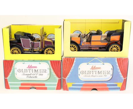 Schuco: A boxed Schuco Old Timer Mercedes, together with a boxed Schuco Renault, both clockwork, complete with key. (2)