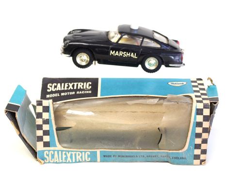 Scalextric: A boxed Tri-ang Scalextric, Aston Martin DB4 G.T. Marshal's Car, black, box as found.