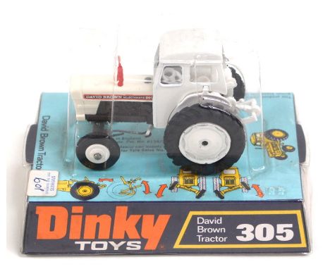 Dinky: A bubbled Dinky Toys, David Brown Tractor, 305, mint condition, all original packaging.