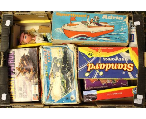 Tinplate: A collection of assorted vintage toys to include: Japanese tinplate Missile Tank; German Sportsboat; Desert Patrol 