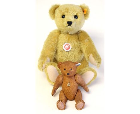 Steiff: A Steiff Cinnamon Bear, 000508, BAR 1909, Replica by Steiff; together with a resin Steiff bear, No. 534 of 2003. (2)