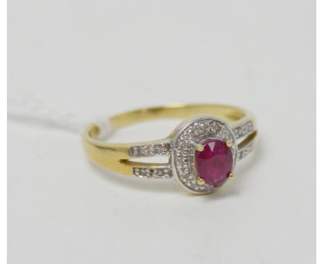 A 9ct yellow gold ruby and diamond set ring, size M 1/2, approx 2.2g.