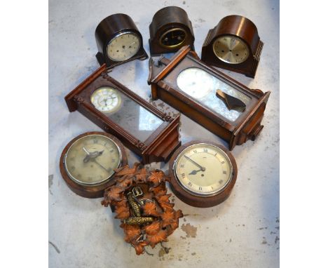 Eight various clocks to include an Enfield Bakelite mantel example, four wall clocks and a cuckoo clock (8).