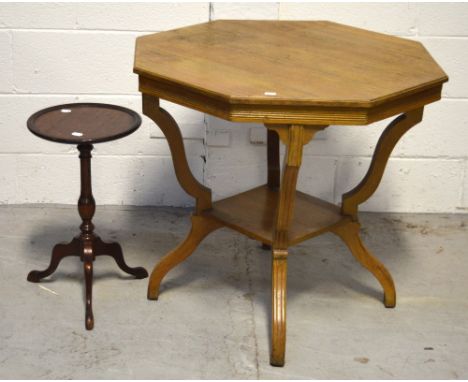 An octagonal oak side table on curving splayed supports and lower shelf and a small circular mahogany side table (2).