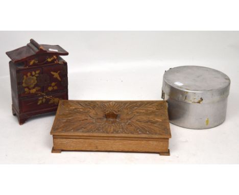 A vintage circular metal nest of boxes, a carved wooden box and an Oriental black lacquered four-drawer jewellery box (3).