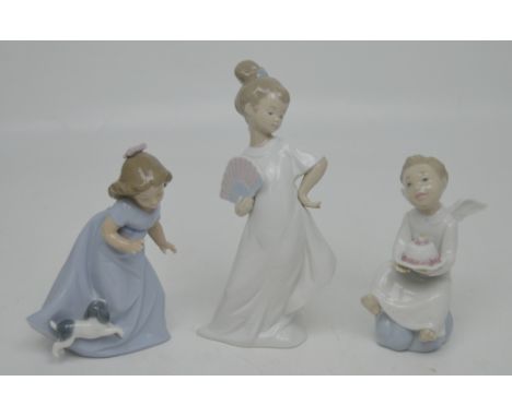 Three Nao figures; 'I Am Pretty', 'Baby's Special Day' and a girl with a puppy (3).