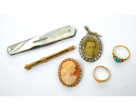 A 9ct yellow gold-framed cameo brooch, a small 9ct yellow gold signet ring, a yellow metal ring with turquoise stones, a hall