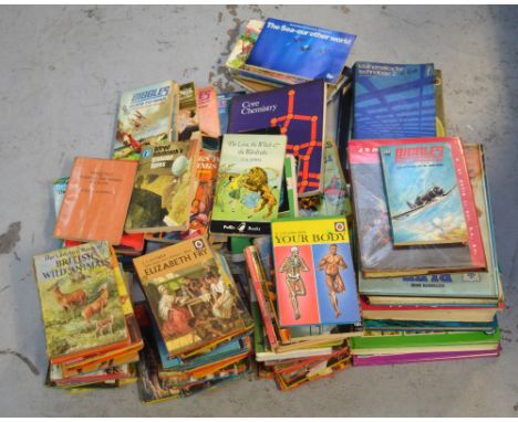 A quantity of mainly vintage children's books to include Ladybird examples.