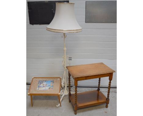 A white painted cast iron standard lamp, a two-tier oak table on barleytwist supports, width 68cm and a retro glass topped co