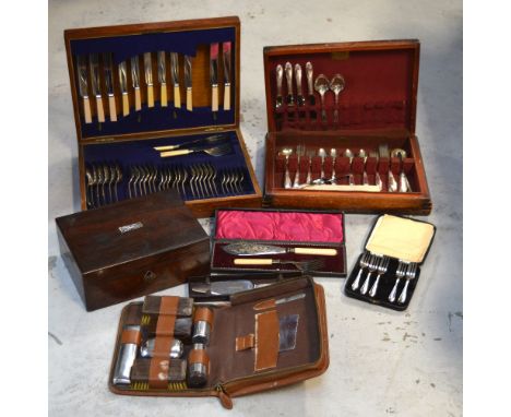 A quantity of silver plated items to include flatware, some housed within two canteens, a bottle coaster etc, also a 19th cen