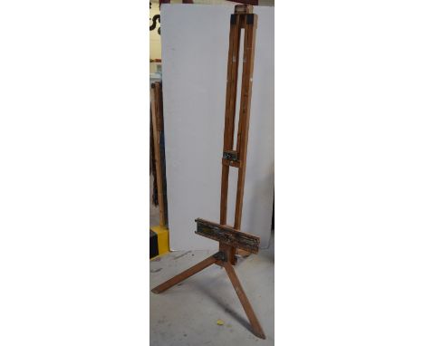 A large Rowney freestanding easel on tripod base, height 174cm.