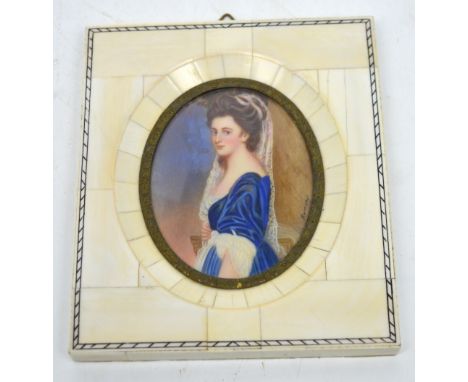 UNATTRIBUTED; a painted oval miniature portrait depicting a young lady in ivory piano key frame, signed indistinctly middle-r