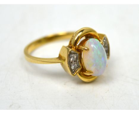 An 18ct yellow gold, opal and diamond set ring, size L, approx 3.8g.