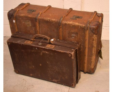 A large vintage travel trunk with travel labels, 93 x 33 x 58cm and a vintage suitcase (2).