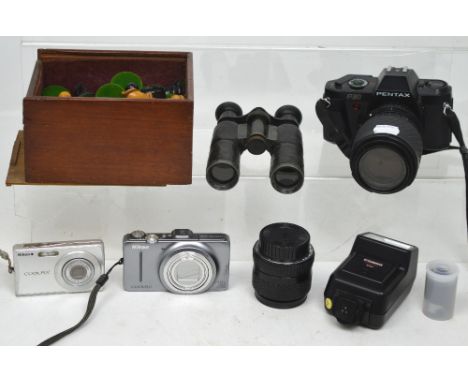 A Nikon Coolpix S200, a Nikon Coolpix S9300, a Pentax P30, a pair Chinon Countryman cased binoculars and a small cased pair o
