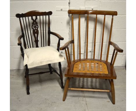 A retro stick back armchair and a similar wheel/stick back chair on turned legs (2).