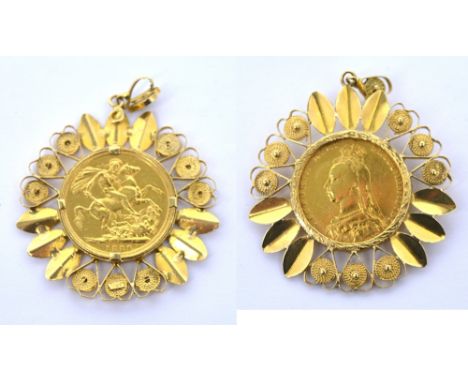 A Victorian old head full sovereign 1889 within 18ct yellow gold floral frame, approx 13.9g.