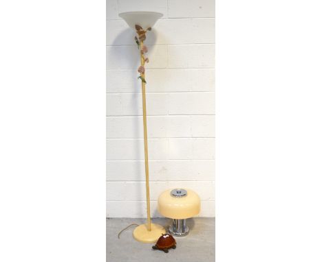 A modern floor standing up-lighter with metal floral decoration, height 178cm, a retro style metal and plastic mushroom shape