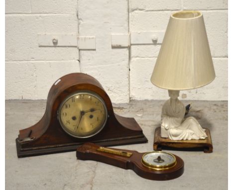 A blanc de Chine and hardwood table lamp, a mahogany Napoleon hat mantel clock and a small wall barometer (3).