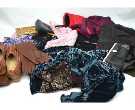 A quantity of vintage clothes to include 1940s style jacket, beaded tops, velvet skirts, a pink Chanel style suit jacket and 