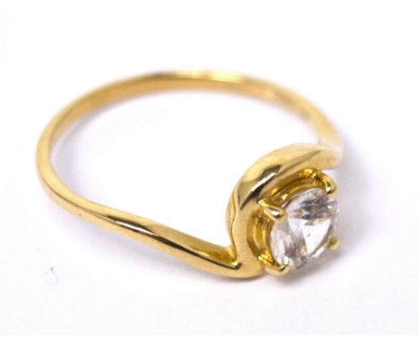 A 9ct yellow gold solitaire dress ring set with a clear stone, size P, approx 2.3g.