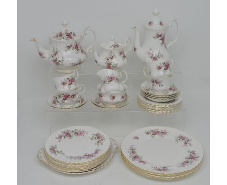 A Royal Albert 'Lavender Rose' part dinner and tea service to include dinner plates, side plates, salad plates, cups, saucers