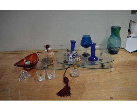 A small quantity of glassware to include a Waterford Crystal mantel clock, a boxed Waterford Crystal atomiser and a boxed pai