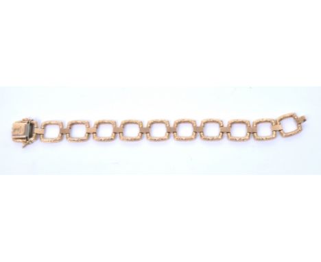 A 14ct yellow gold bark-effect link bracelet, approx 26.4g.