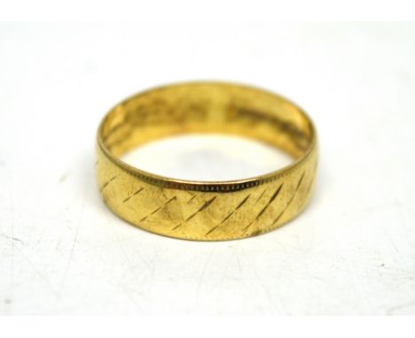 A 9ct yellow gold band, size N, approx 1.9g.