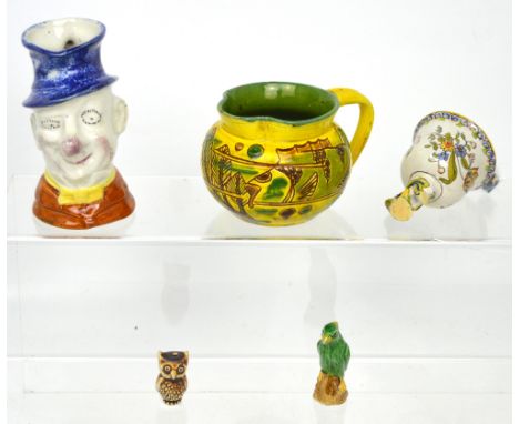 A C H Brannam yellow ground jug, signed and dated 1904 to base and a further small quantity of decorative ceramics to include