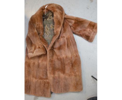 A ladies' vintage blonde musquash full-length fur coat.