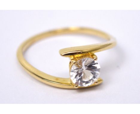 A 9ct yellow gold solitaire dress ring set with a clear stone, size P, approx 2.3g.