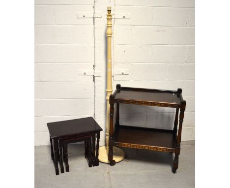 An oak two-tier tea trolley in the priory style, a contemporary oak nest of three graduated rectangular occasional tables and