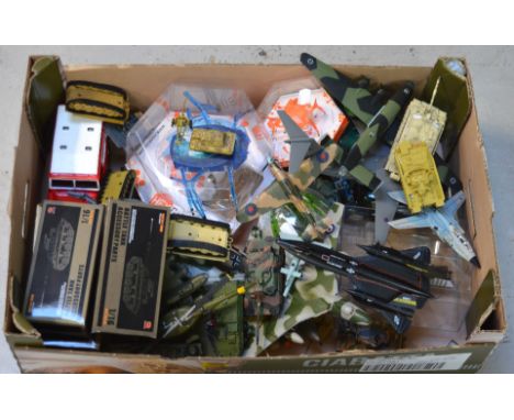 A quantity of model planes and tanks, metal aeroplanes, two model cars and various other model vehicles.