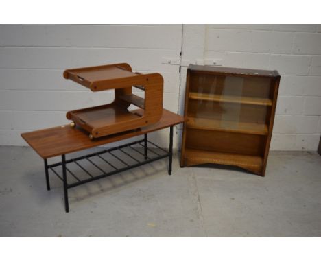 A small twin-shelf glazed bookcase, a retro teak coloured coffee table with lower metal shelf and a retro trolley (3).