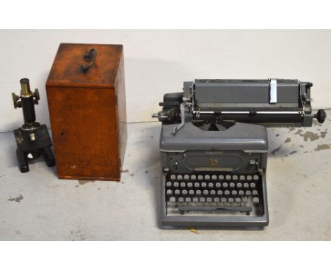 A mahogany cased Hearson of London microscope, model no30 and a vintage Imperial typewriter (2).
