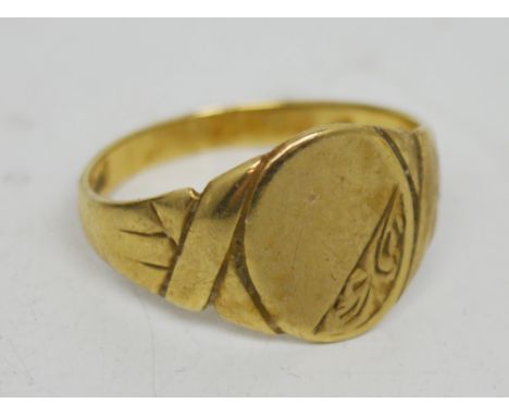 A 9ct gold signet ring, size R, approx 3.6g.