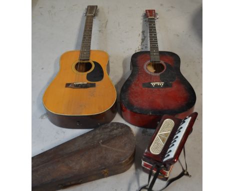 Two guitars to include a Martin Smith example, a vintage Studio accordion and a wooden violin case (4).