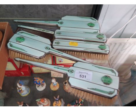 A silver and enamel six piece brush and mirror set (mirror and comb as found)