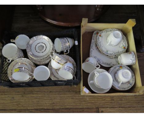 A Heathcote china part tea service with fruit and foliate pattern and a Ashley gilded part tea service