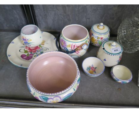 Eight pieces of Poole Pottery, floral designs, various