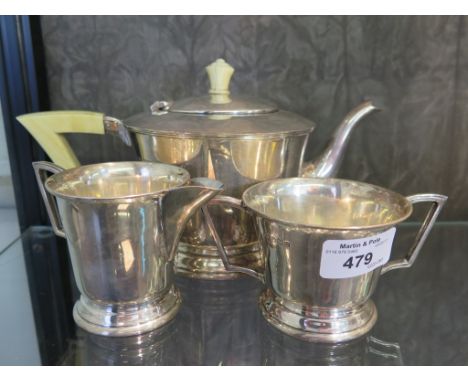 A silver Art Deco three piece tea set with bone handle and finial to teapot, Sheffield 1937 