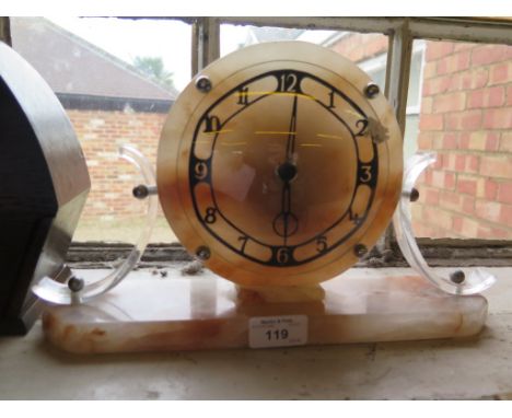 A 1930's pink alabaster mantel clock with clear plastic supports and Temco movement, 19.5cm