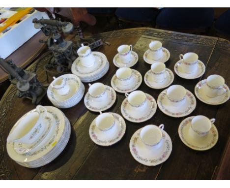 A Royal Doulton Pastoralle pattern dinner service for eight place settings, and a Paragon Belinda pattern part tea and coffee