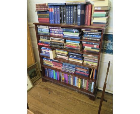 A mahogany open bookcase, with moulded top and graduated shelves on bracket feet, 122cm wide