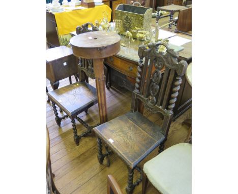 A pair of late Victorian oak occasional chairs, with barley twist and vine carved backs on sold seats and barley twist legs, 