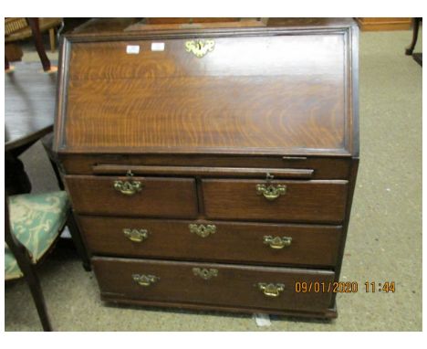 18TH CENTURY OAK BUREAU, APPLIED WITH A LATER GALLERIED TOP OVER FALL FRONT ENCLOSING FITTED INTERIOR, TWO SHORT AND TWO FULL